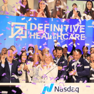 The Definitive Healthcare leadership team celebrates their IPO with confetti