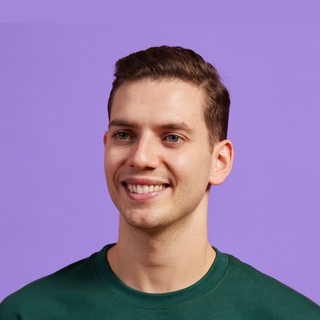 Portrait of splose CEO Nicholas Sanderson against purple background